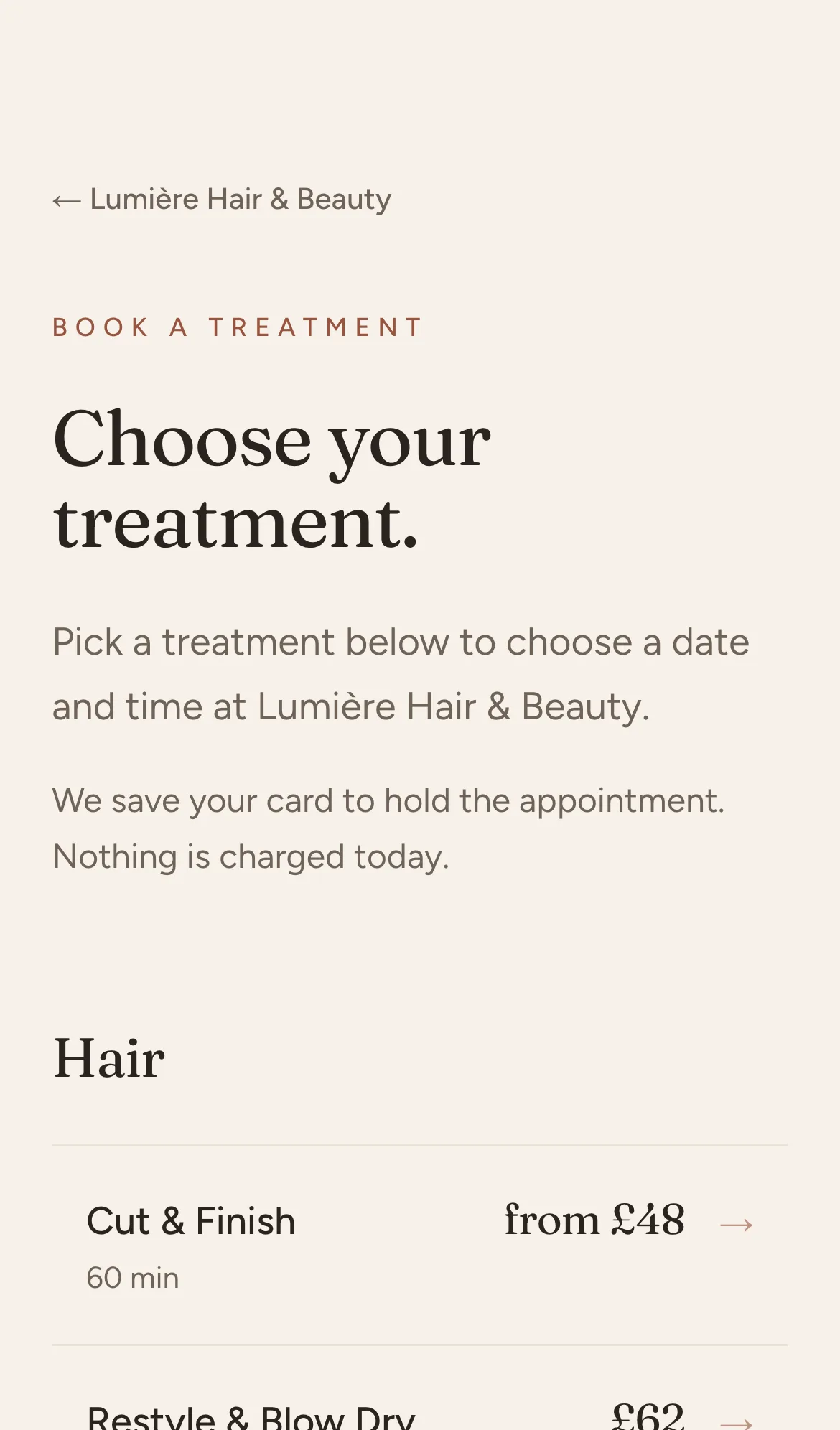 A client choosing a time on a Mintbook salon booking site on a phone